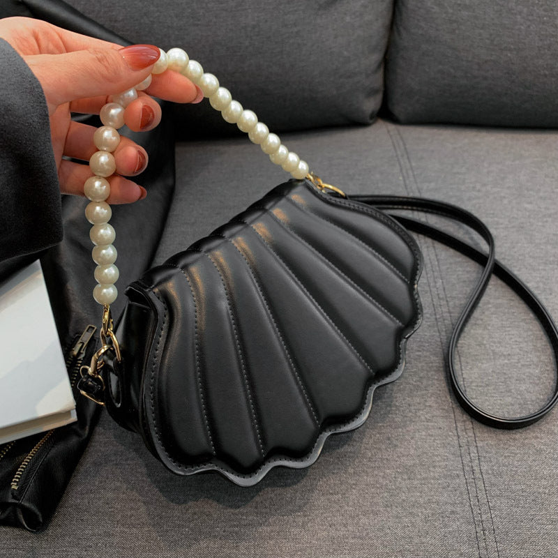 Elegant Pearl-Handled Clutch — product view 1