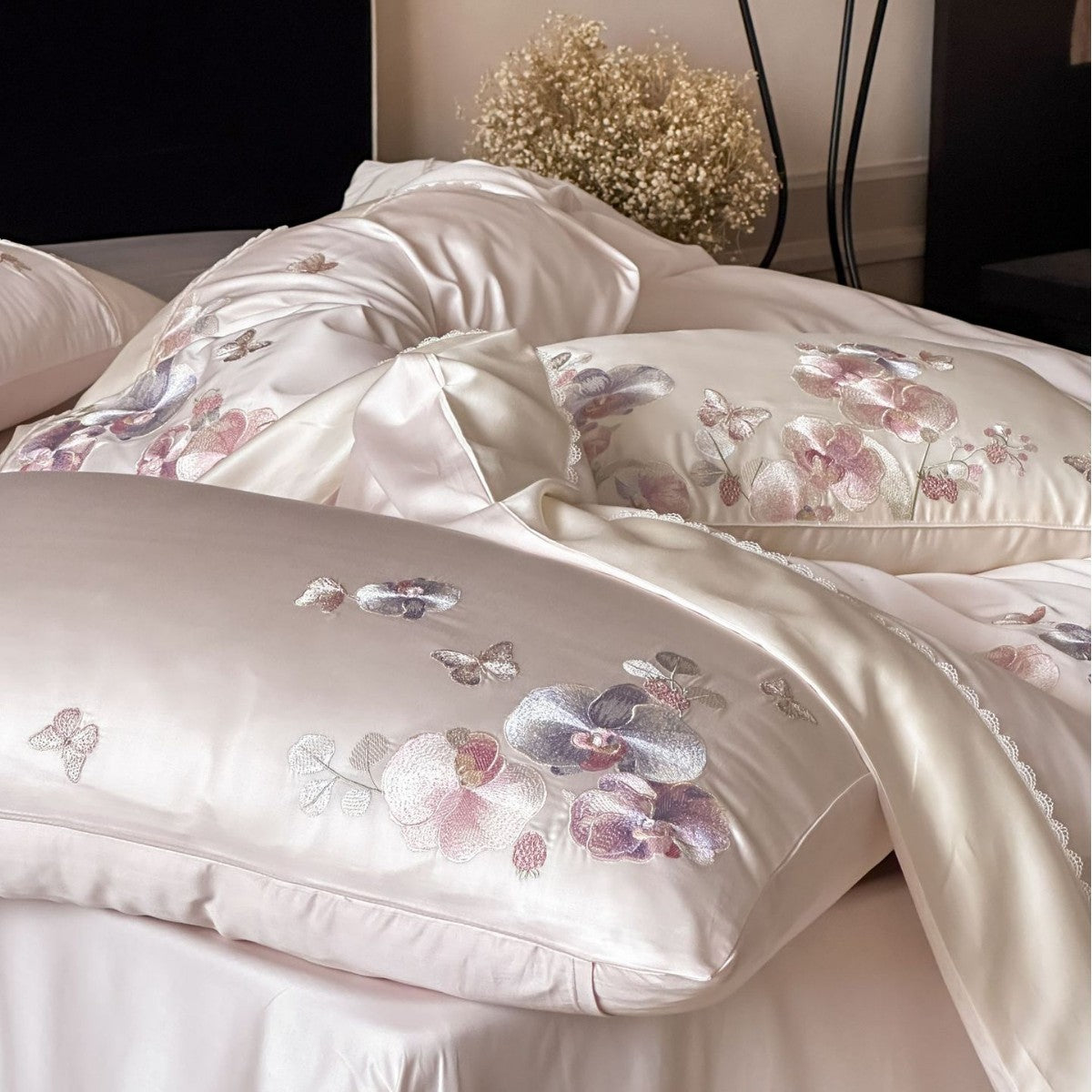 Luxurious satin bedding set with floral embroidery and butterfly appliqué — product view 2