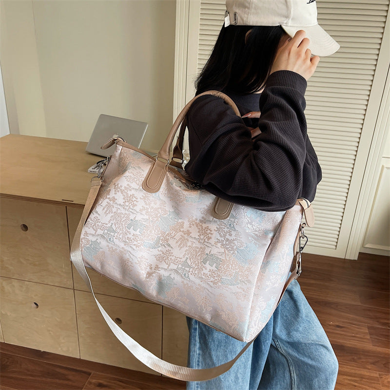 Elegant travel bag with luxurious pattern print LoungeYard — product view 1