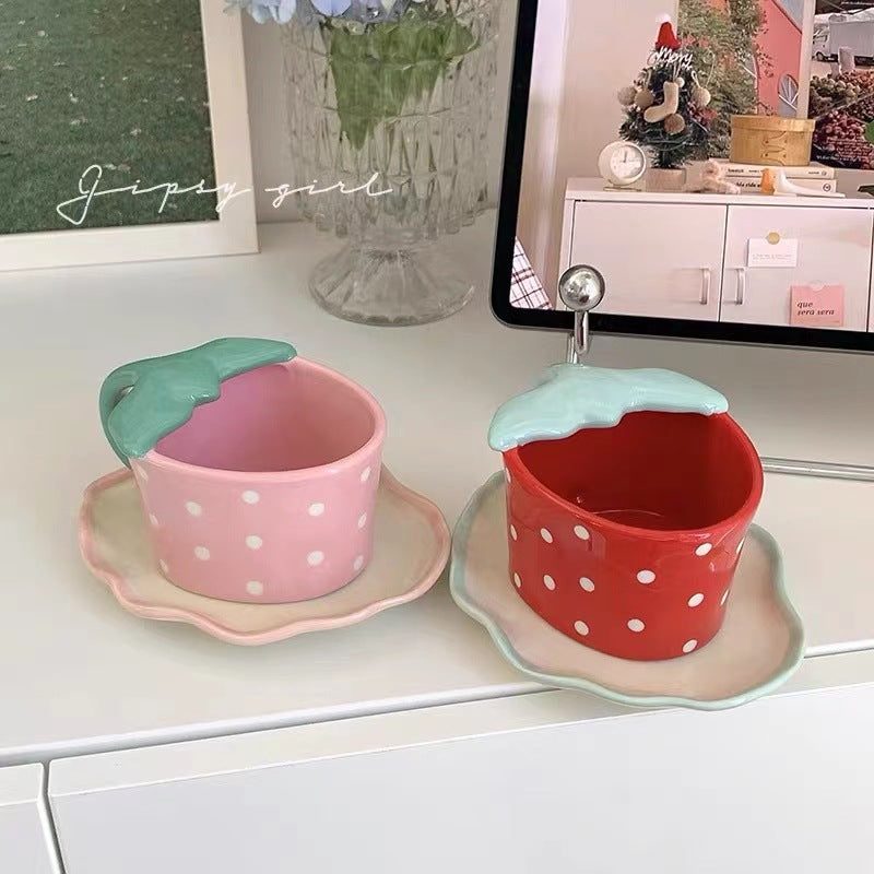 Playful ceramic mug with shaped leaf handle, saucer, and tulip spoon — product view 1