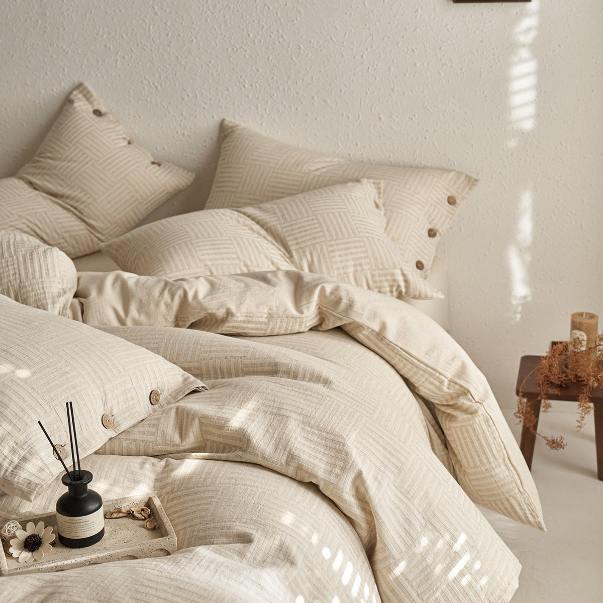 Reversible cotton bedding set with button closure and subtle geometric jacquard — product view 1