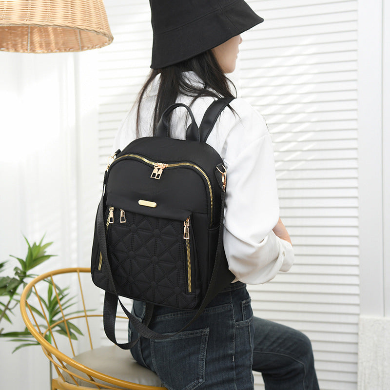 Elegant backpack bag with structured design and practical compartments LoungeYard — product view 6