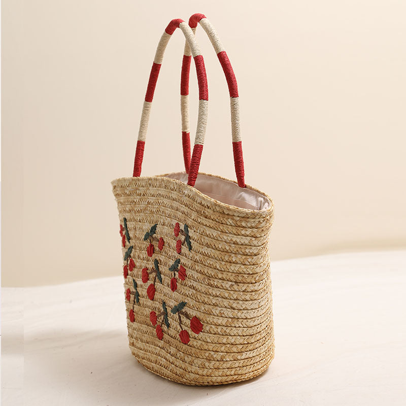Handcrafted basket bag with vibrant floral embroidery design LoungeYard — product view 4