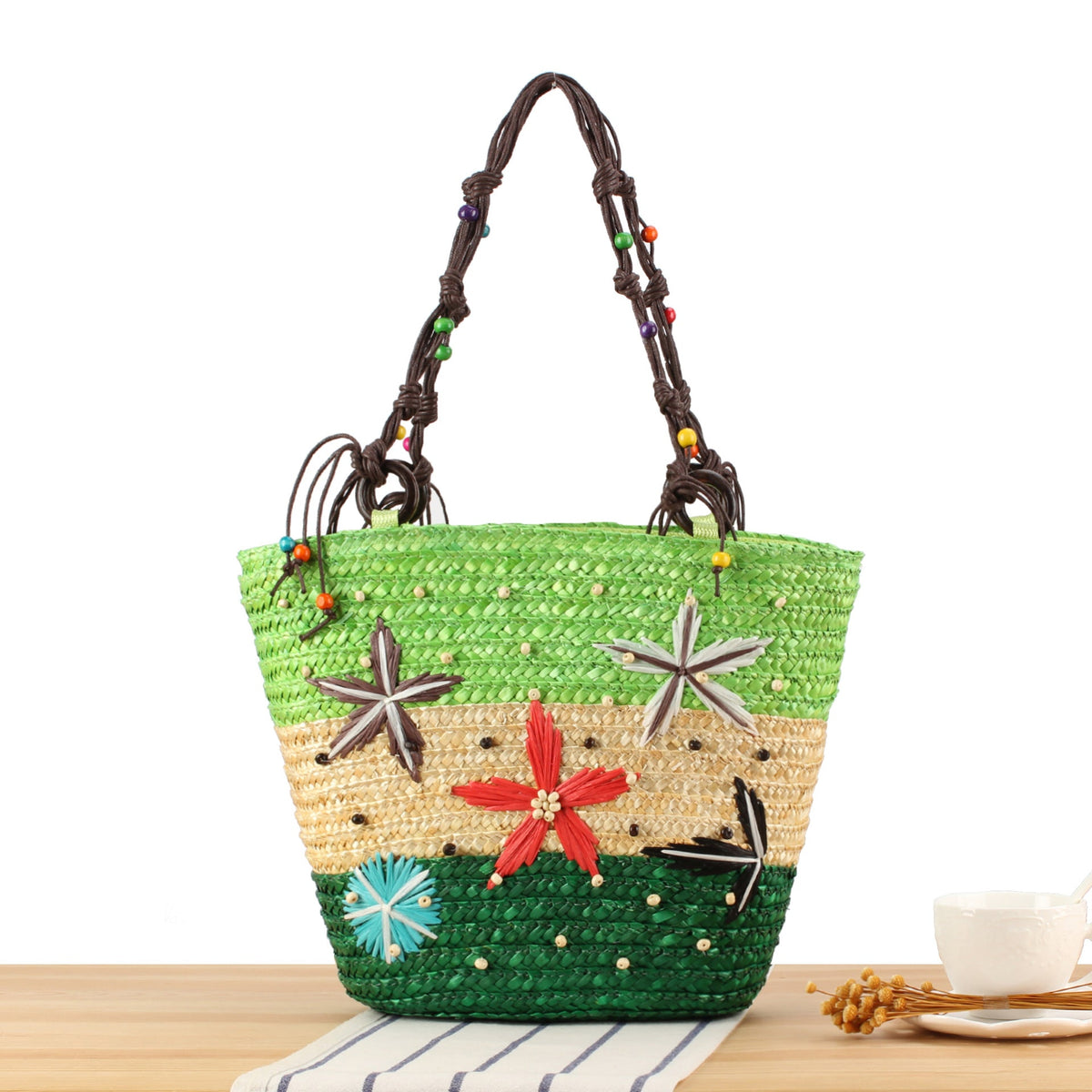 Handcrafted beach bag with cheerful floral patterns LoungeYard — product view 5