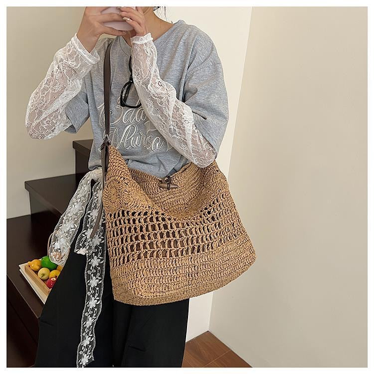 Braided summer handbag with practical leather handles LoungeYard — product view 2