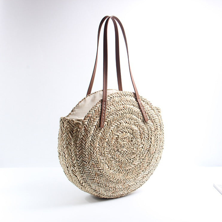 Braided straw beach bag with elegant leather handles LoungeYard — product view 2