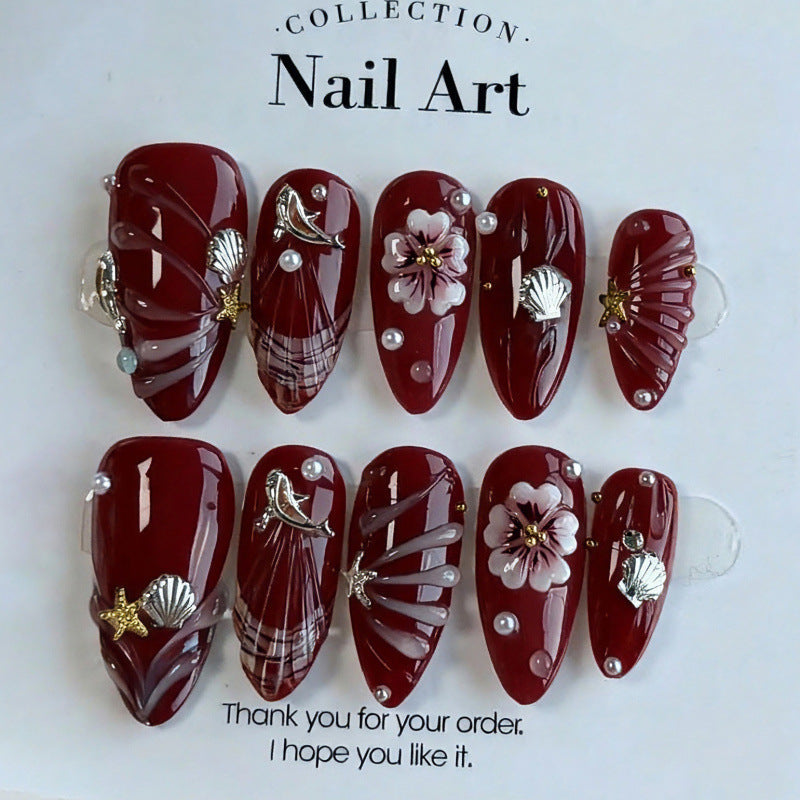 Elegant Nail Art Set with Floral and Shell Accents — product view 1