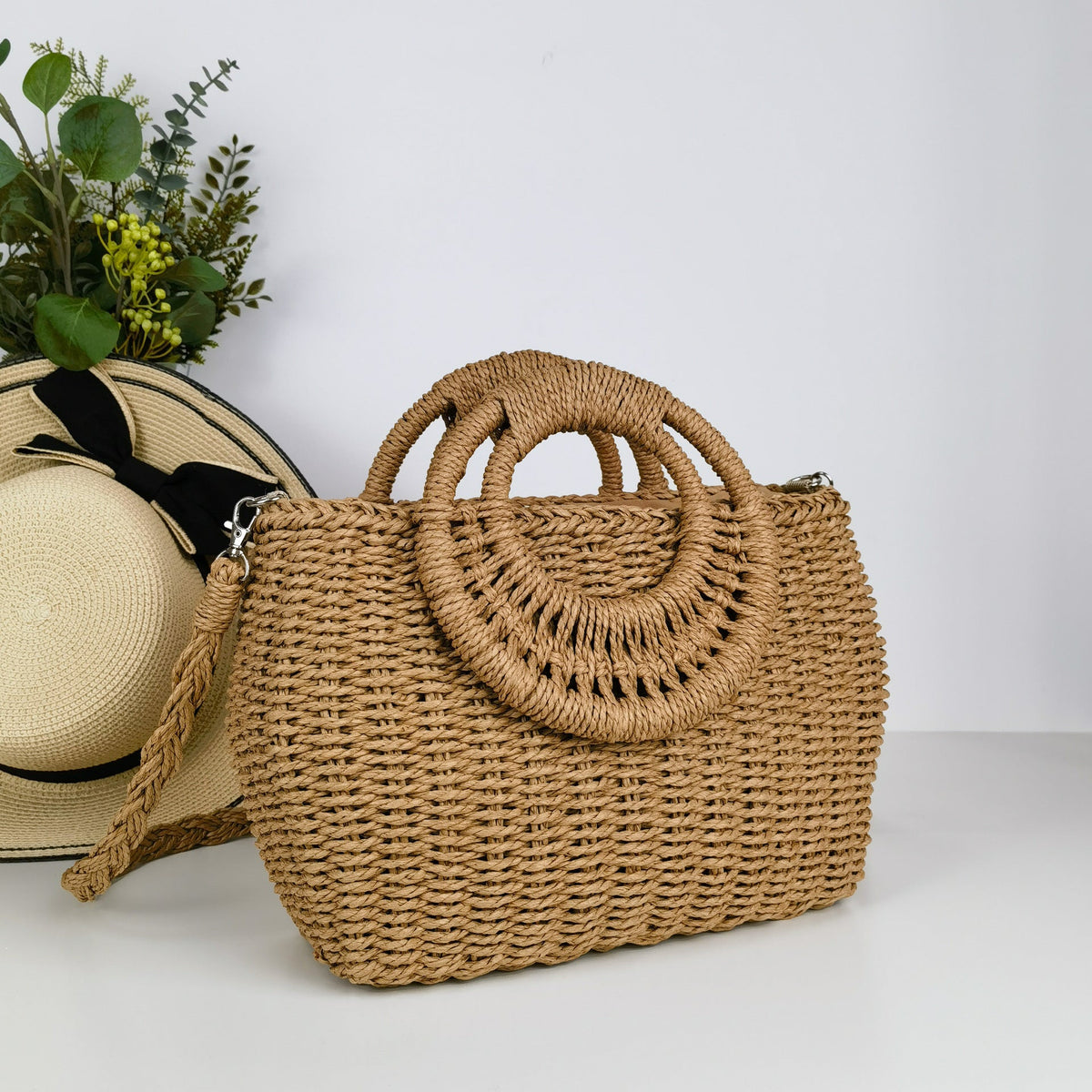Handcrafted rattan bag with shoulder strap LoungeYard — product view 1