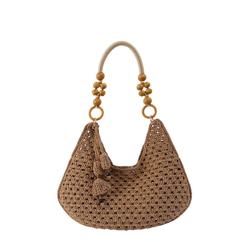 Handmade crochet bag with colorful tassels LoungeYard — product view 6