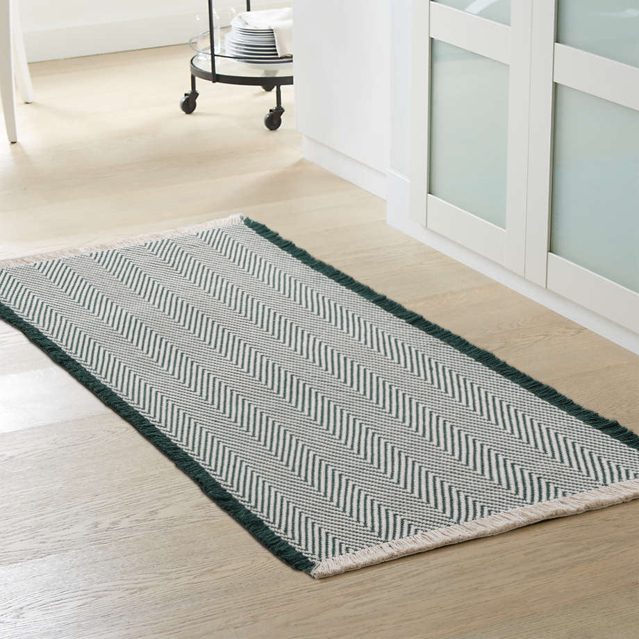 Handwoven cotton bath mat with herringbone pattern and fringes LoungeYard — product view 4