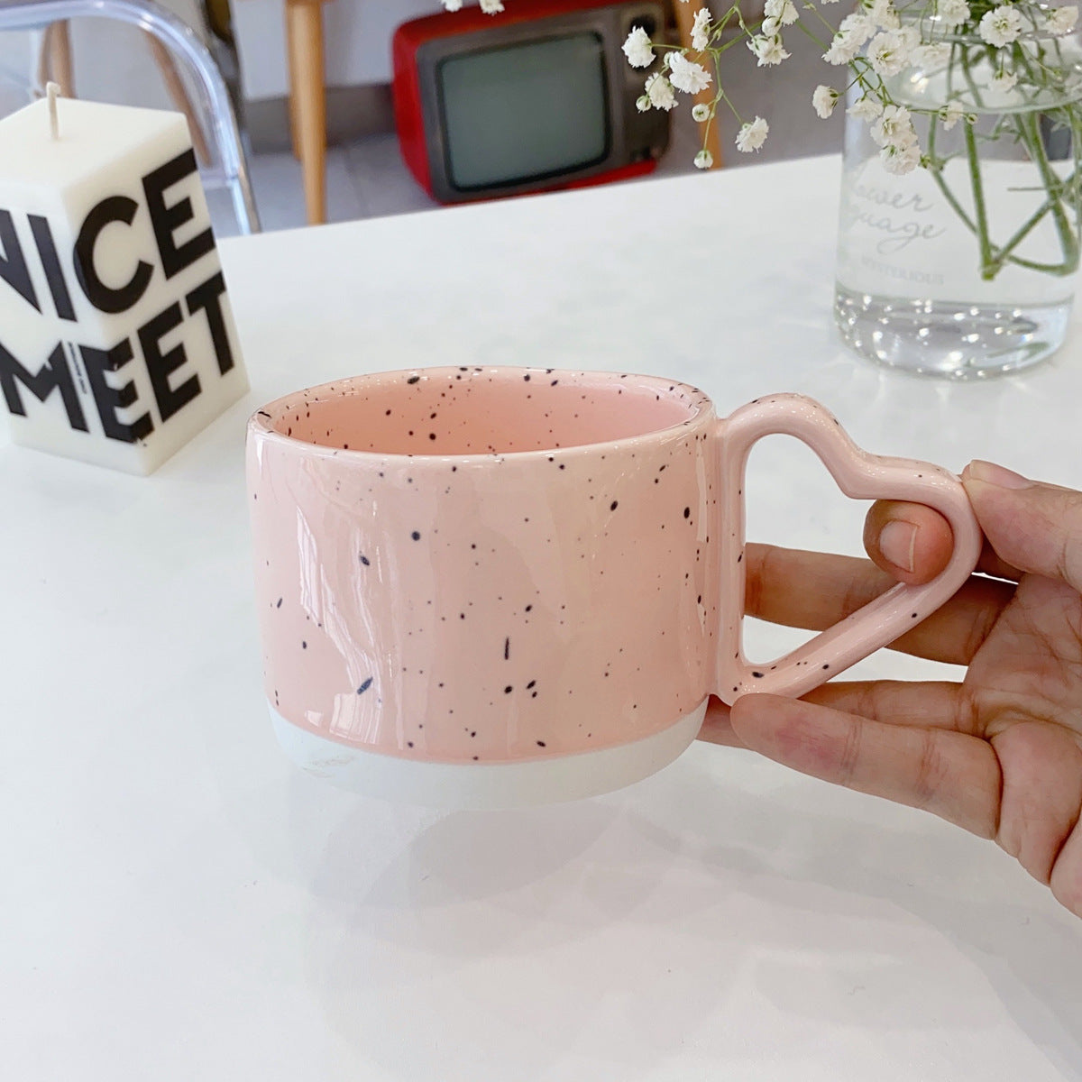 Oversized ceramic mug with heart-shaped handle and dotted glaze — product view 7