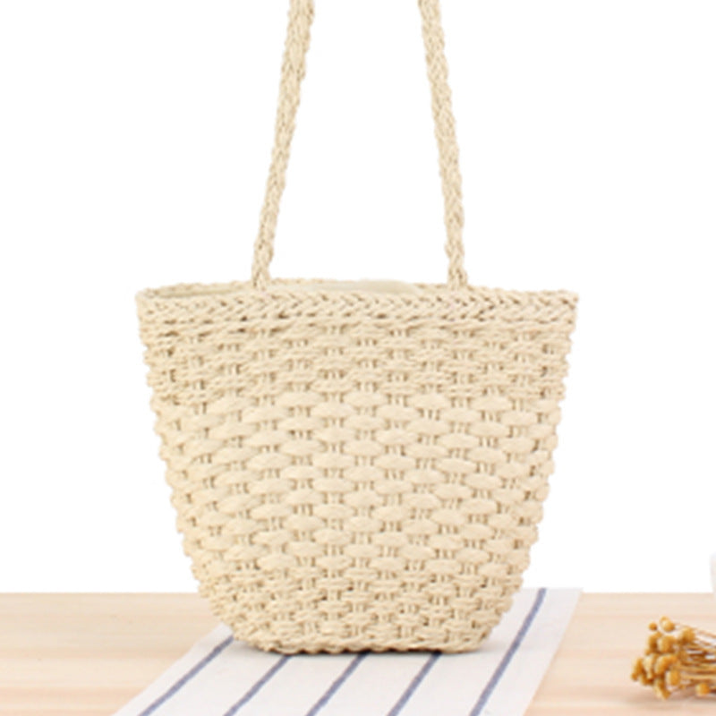 Braided handbag made of natural raffia with robust carrying straps LoungeYard — product view 6