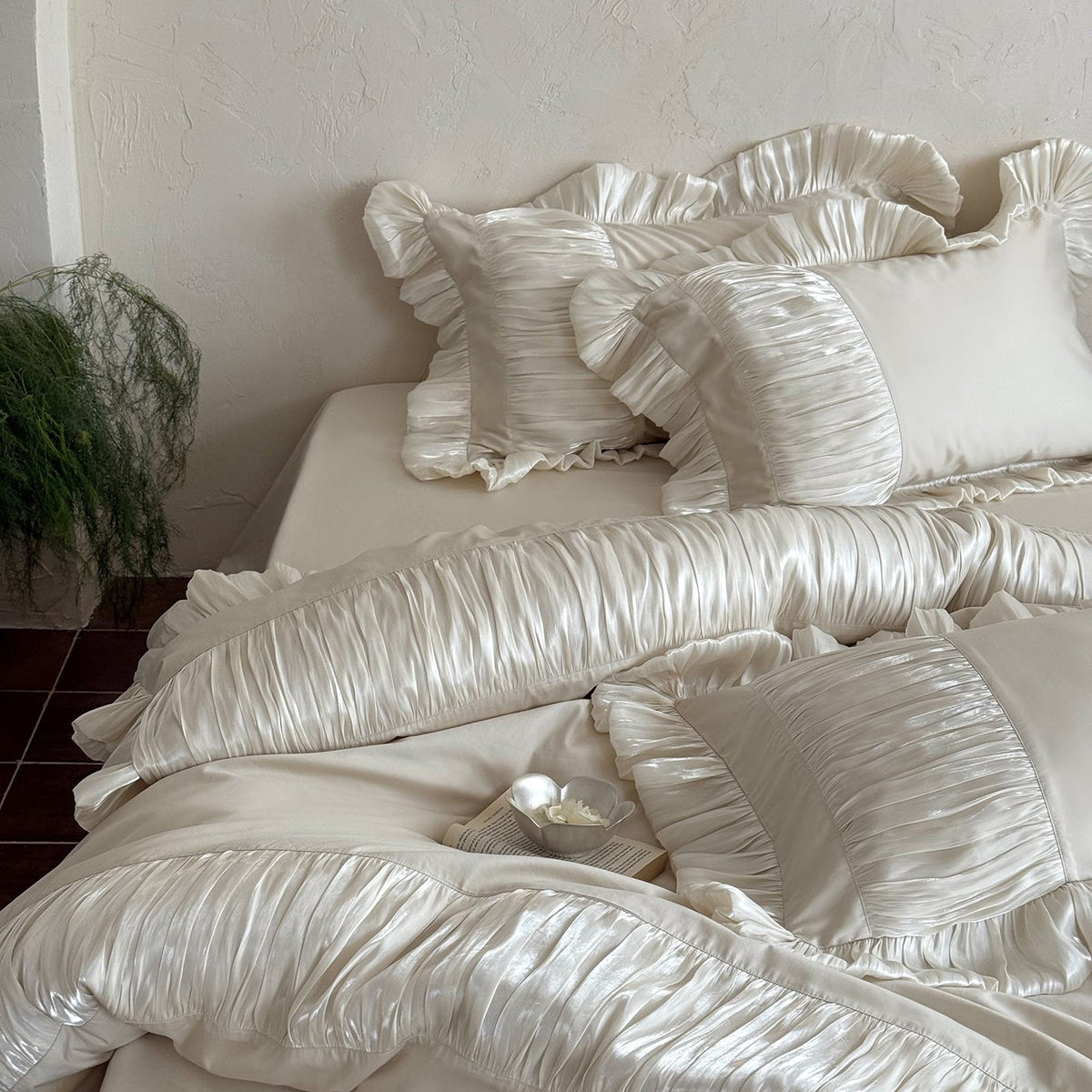 Elegant satin bed linen set with pleated inserts, ruffled edges and decorative cushions LoungeYard — product view 2
