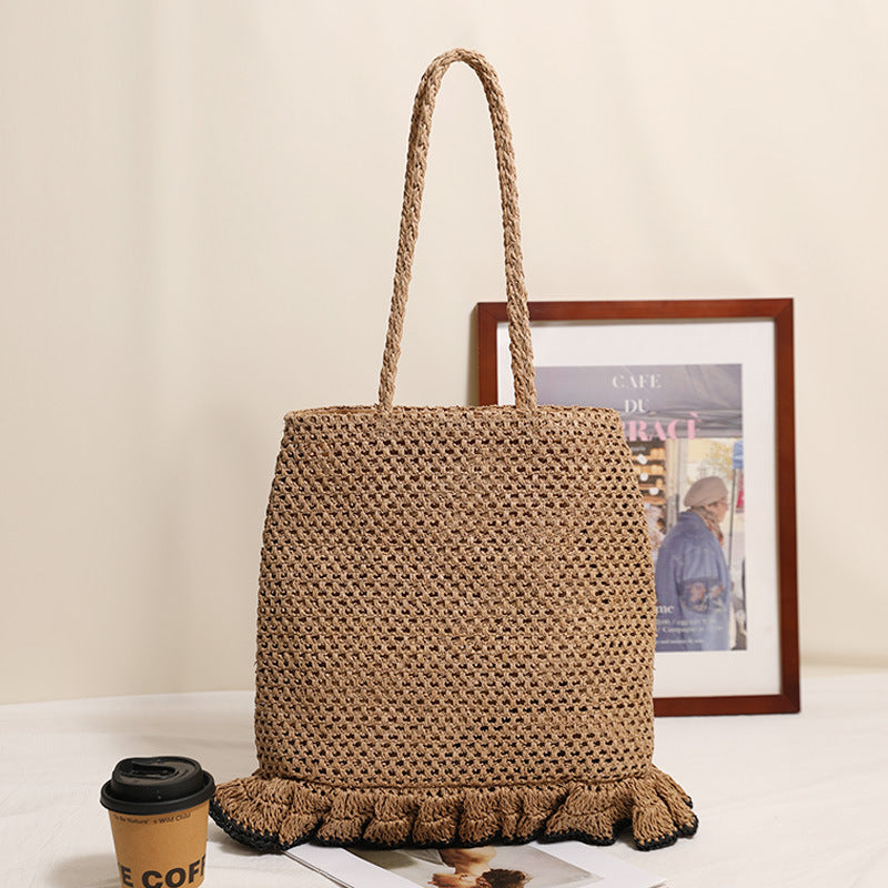 Handcrafted straw bag with fringed hem LoungeYard — product view 7