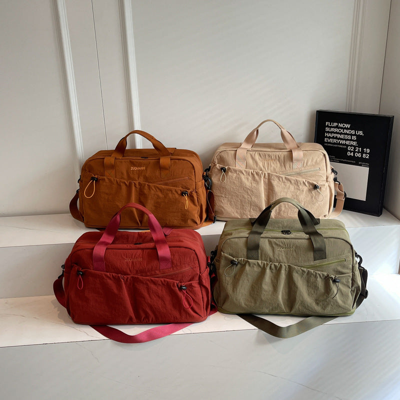 Sporty and Functional Travel Bag with Multiple Outer Pockets LoungeYard — product view 2
