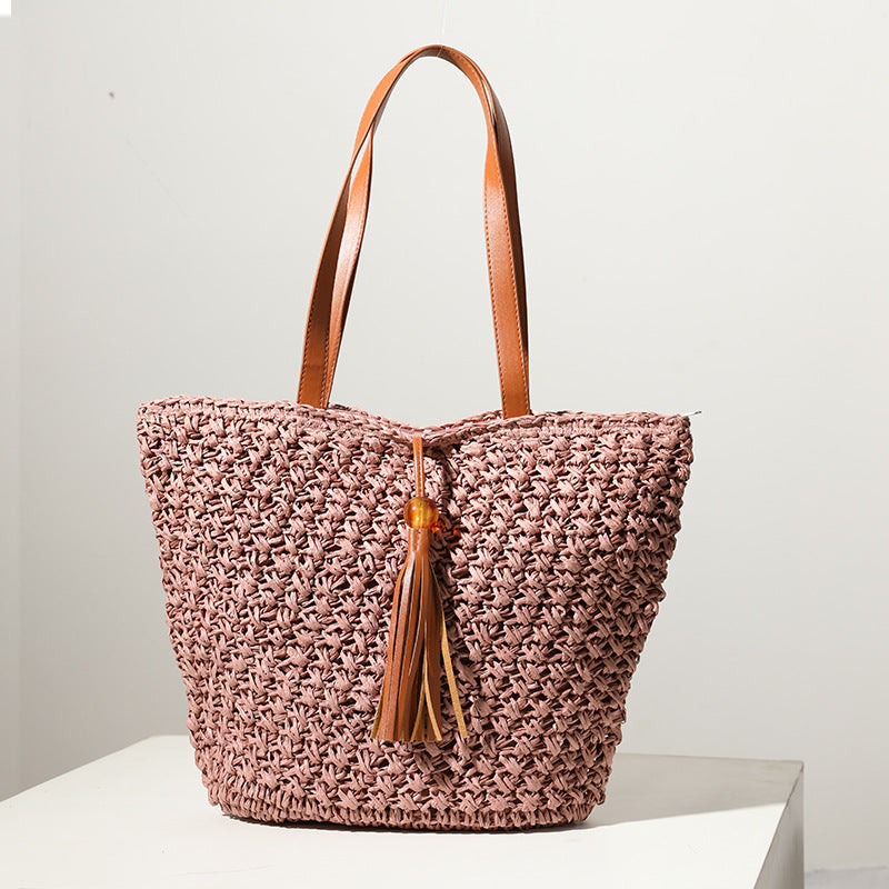 Handcrafted basket bag with fashionable tassel detail LoungeYard — product view 2
