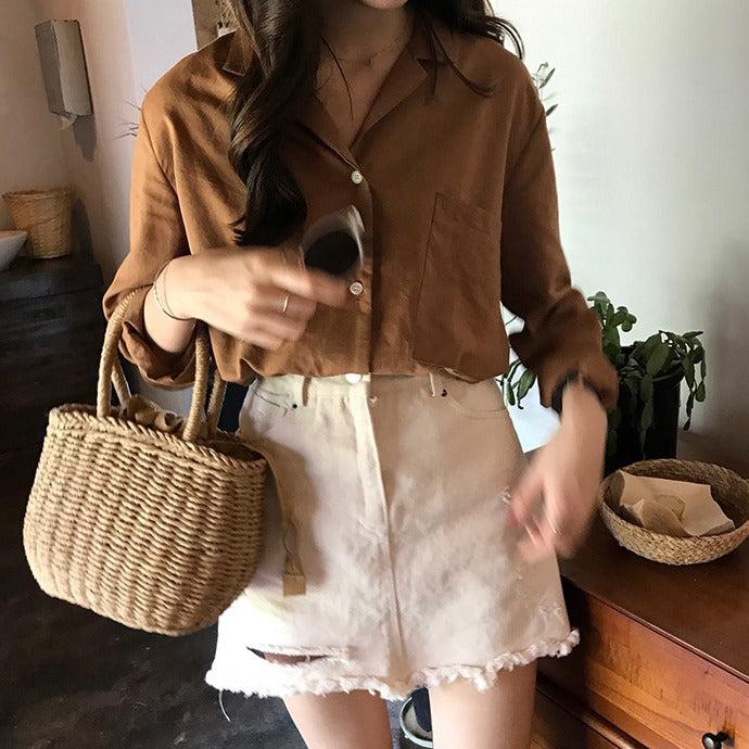 Handcrafted rattan bag with refined details LoungeYard — product view 2