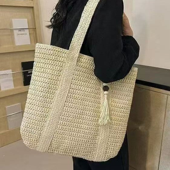 Handbag Made of Natural Weave with Decorative Tassel Detail LoungeYard — product view 3