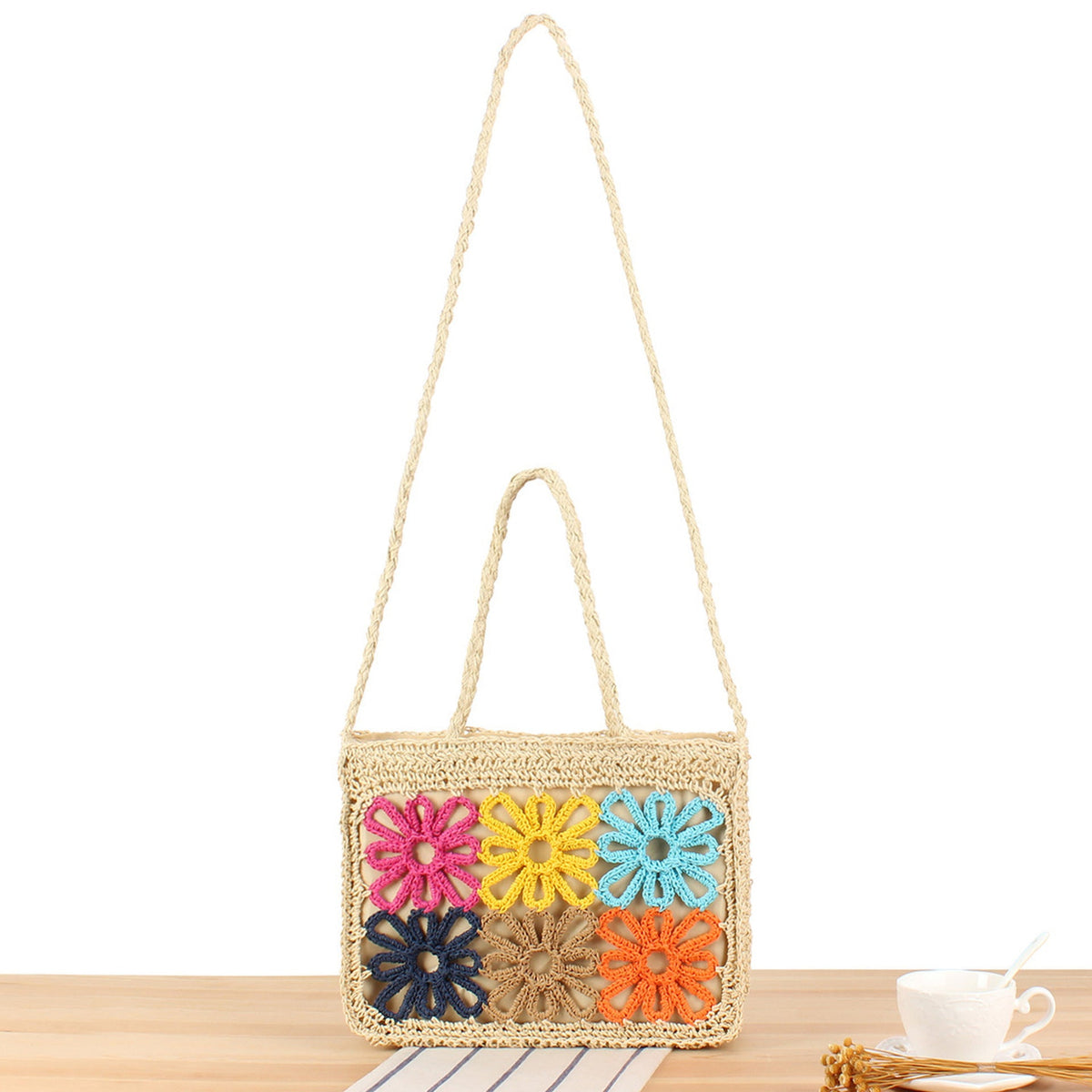Handcrafted basket bag with colorful flower design LoungeYard — product view 1