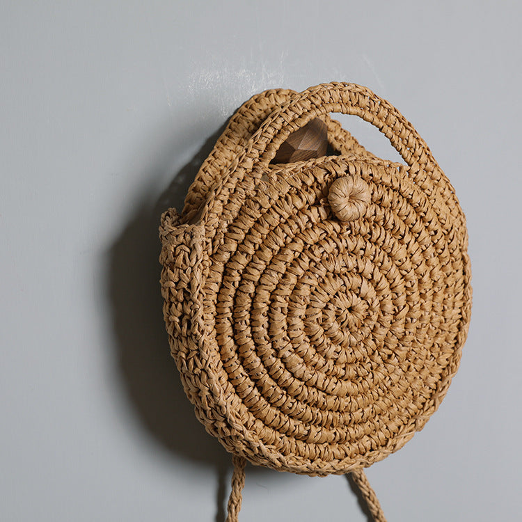 Handcrafted Round Wicker Bag with Elegant Closure LoungeYard — product view 6