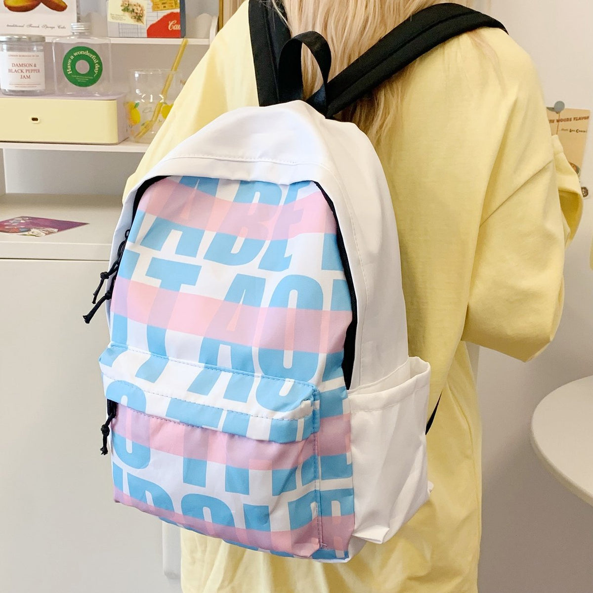 Leisure backpack with eye-catching graphic design and practical compartments LoungeYard — product view 1