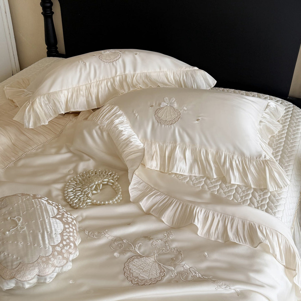 Elegant embroidered satin bedding set with frill pillow and quilted bedspread LoungeYard — product view 4