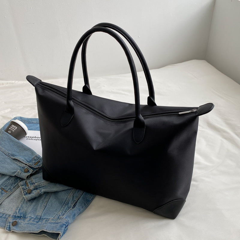 Large travel bag with durable material and multiple compartments LoungeYard — product view 6
