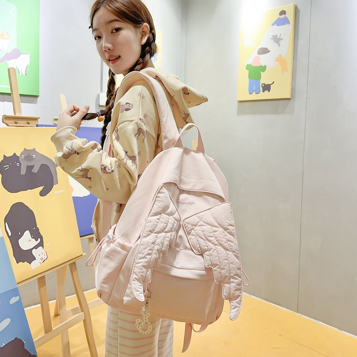 Cute Wing-Embellished Casual Backpack LoungeYard — product view 1