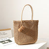 Handmade straw bag with pompom details LoungeYard — product view 7