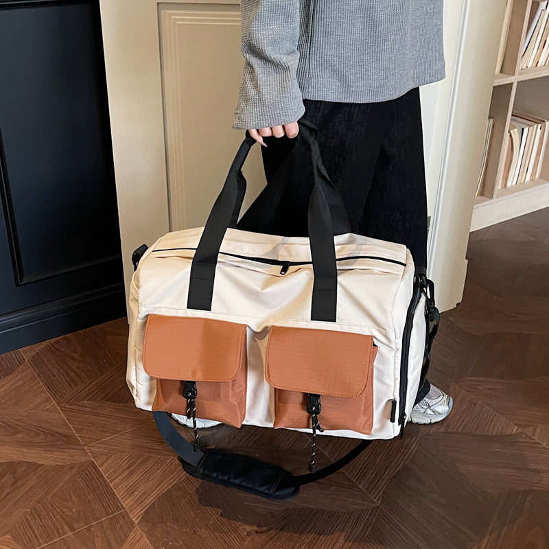Multifunctional tote bag with comfortable shoulder padding and numerous outer pockets LoungeYard — product view 1
