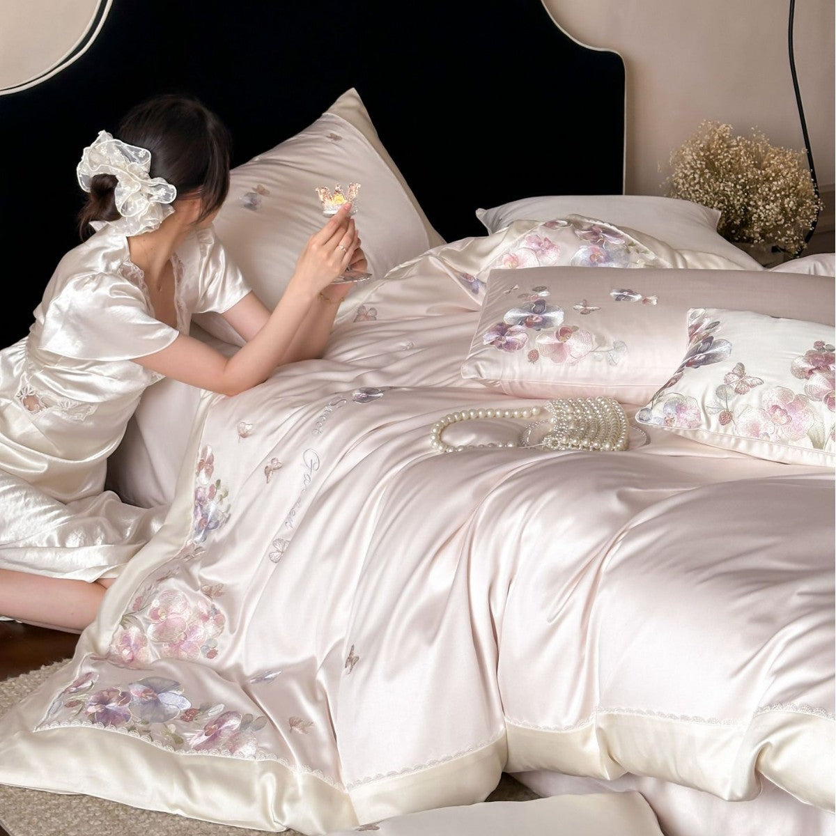 Luxurious satin bedding set with floral embroidery and butterfly appliqué — product view 3