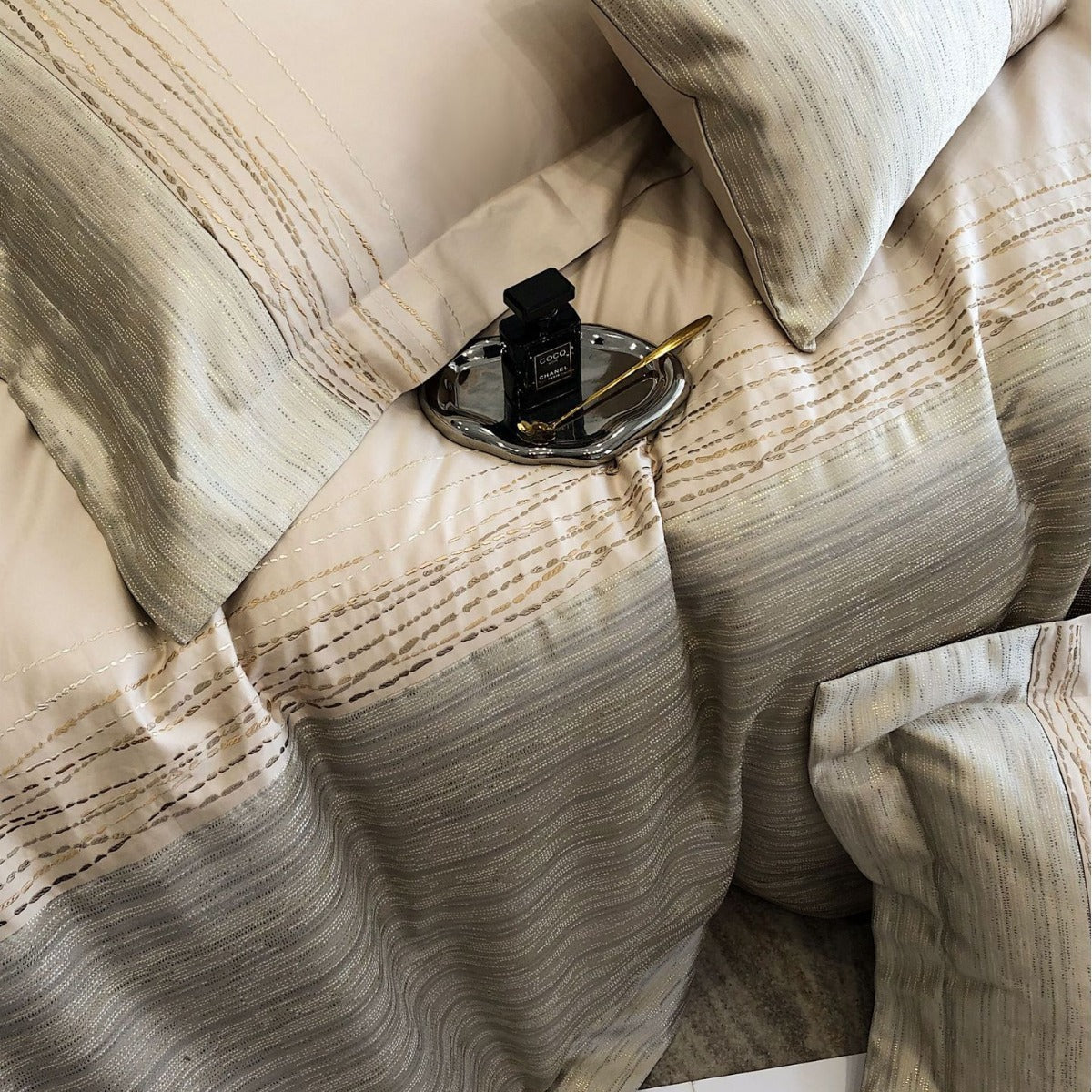 Luxurious satin bedding set with jacquard texture and decorative pillow — product view 1