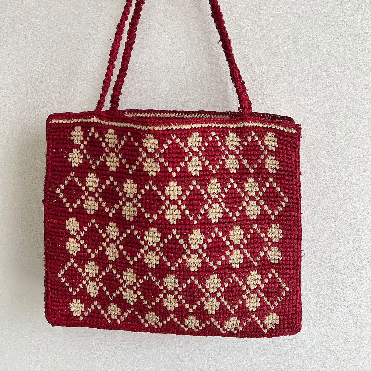 Handcrafted knit bag with floral design LoungeYard — product view 4