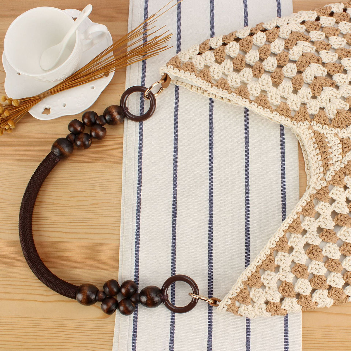 Handmade straw tote bag with elegant wooden handles LoungeYard — product view 2