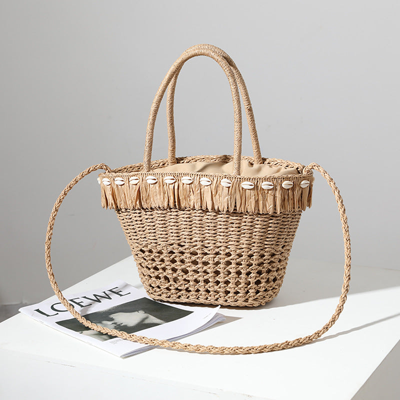 Braided straw bag with decorative tassel detail LoungeYard — product view 4