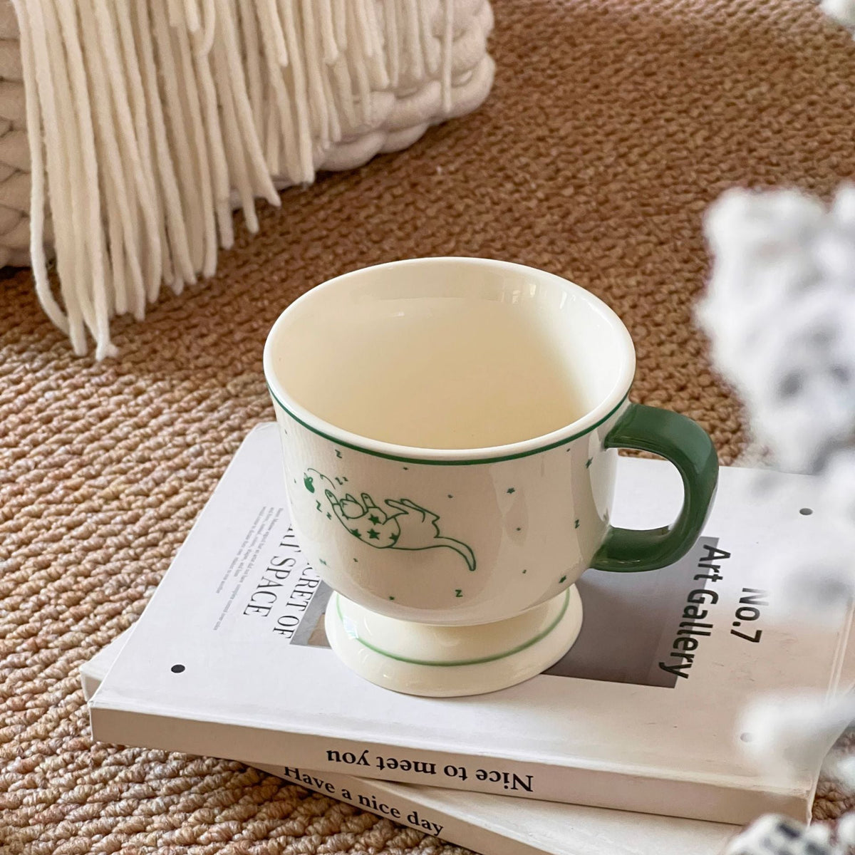 Handcrafted ceramic plate with illustrative cat design — product view 6