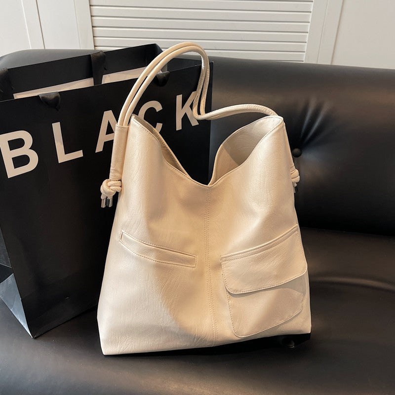 Casual tote bag with practical front pockets LoungeYard — product view 3