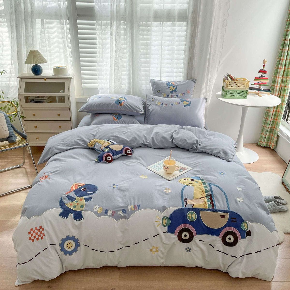 Children's bedding set with embroidered dinosaur and car appliqués LoungeYard — product view 1