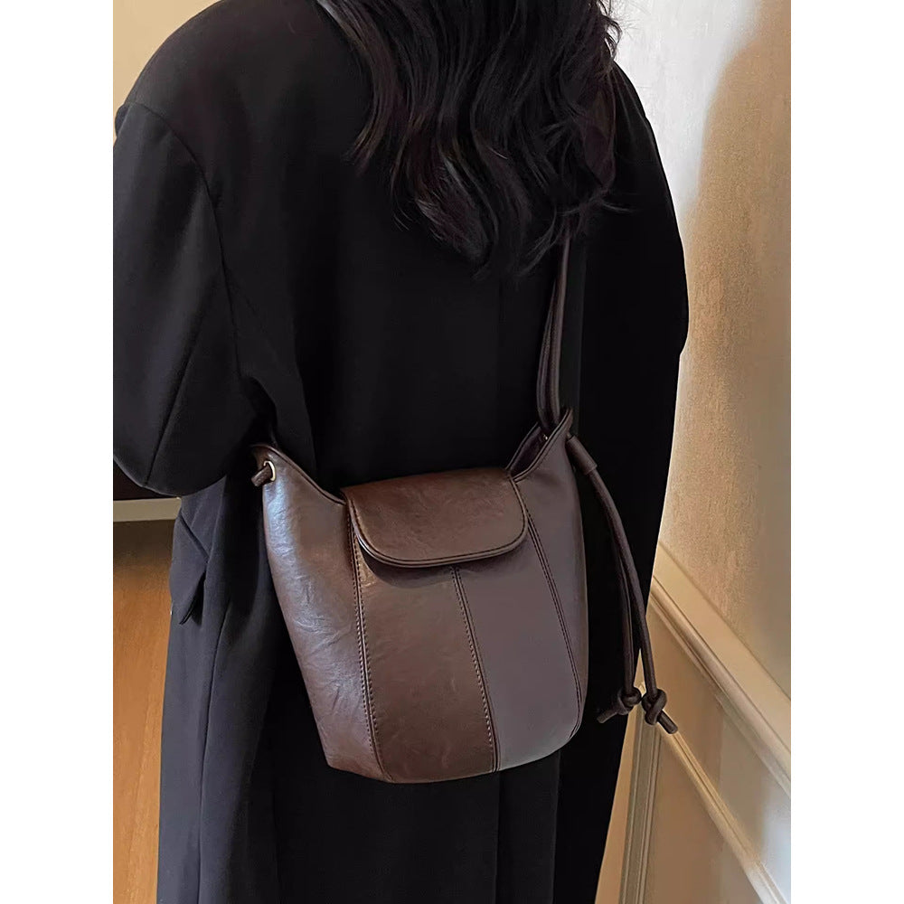 Contemporary Leather Drawstring Bucket Bag LoungeYard — product view 1