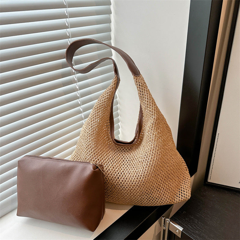 Handcrafted Woven Straw Tote with Removable Pouch — product view 1