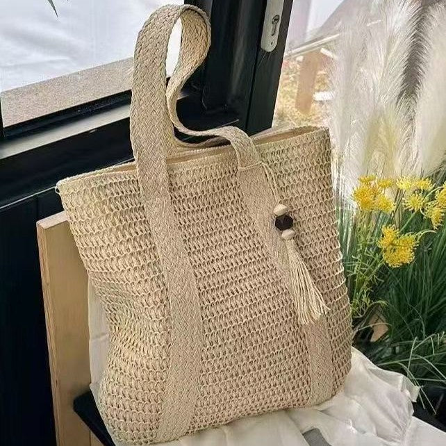 Handbag Made of Natural Weave with Decorative Tassel Detail LoungeYard — product view 4