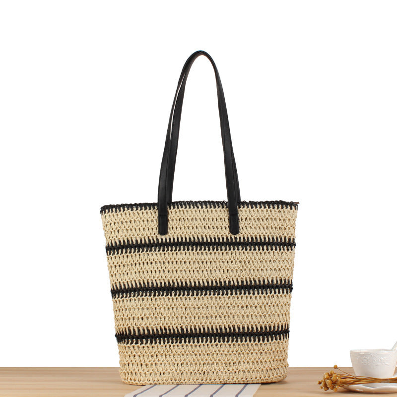 Fashionable beach bag made of woven natural material with elegant straps LoungeYard — product view 1