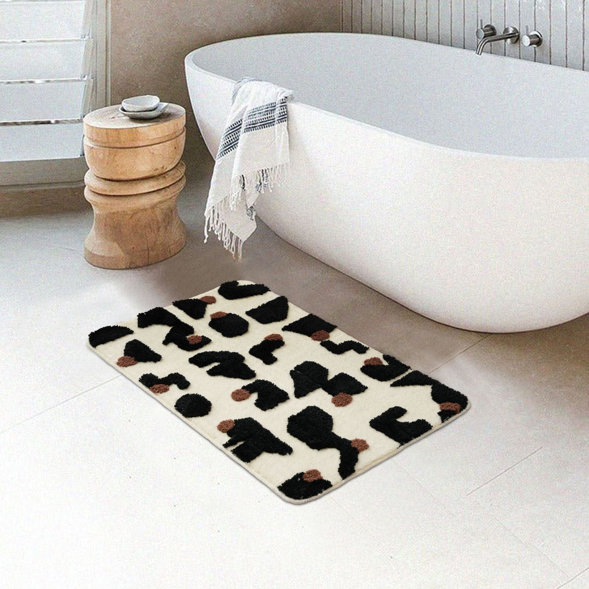 Tufted bathroom mat in abstract leopard pattern with soft high pile LoungeYard — product view 1
