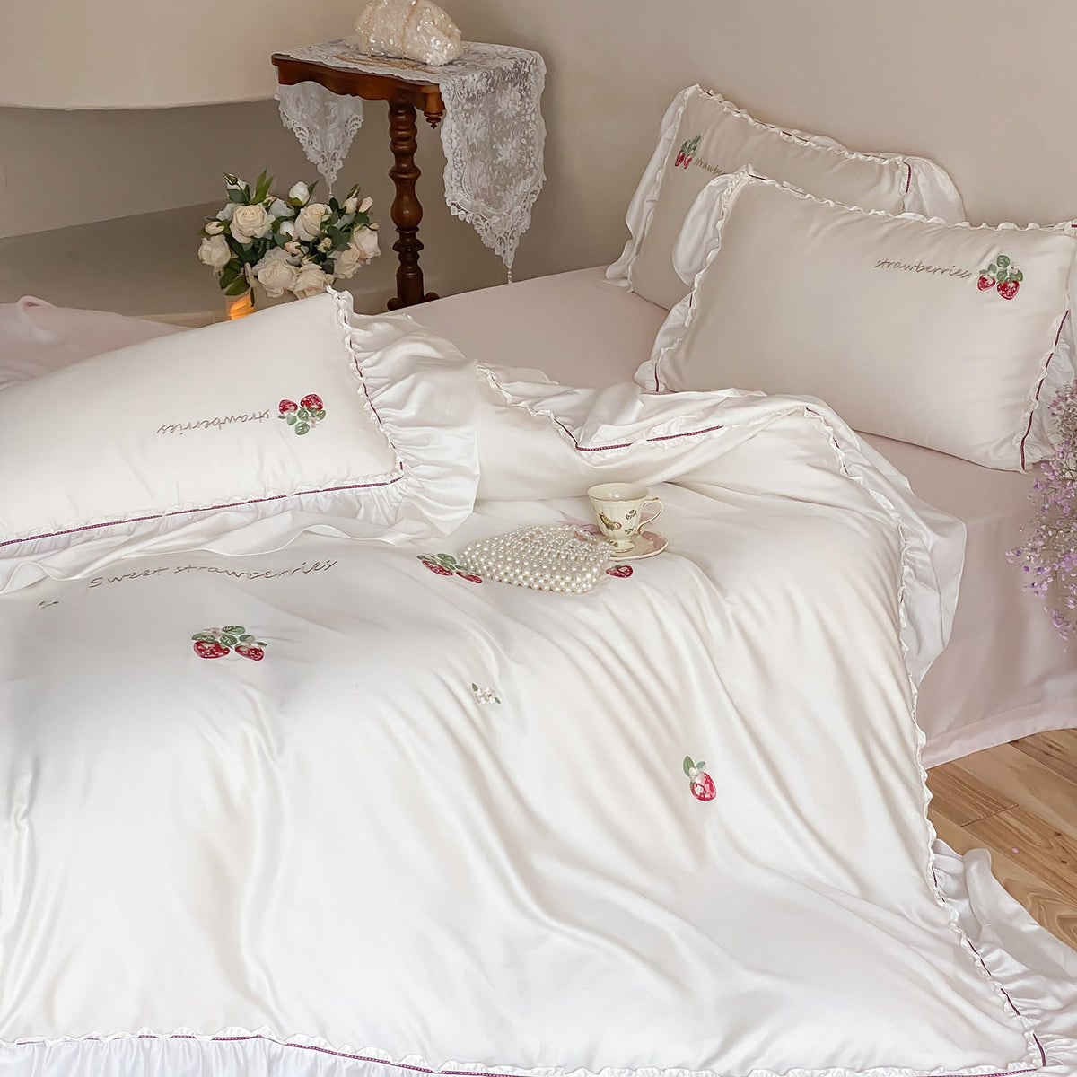 Romantic satin bedding set with strawberry embroidery and ruffles — product view 2