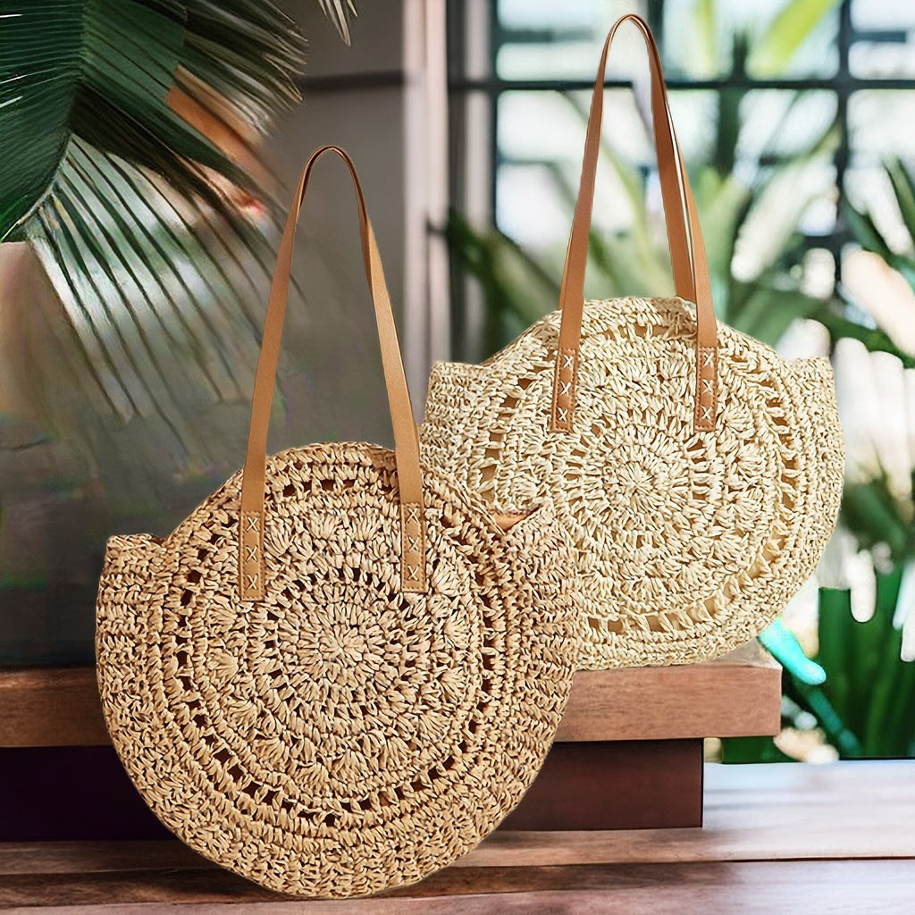 Handcrafted Round Straw Bag with Elegant Leather Handles LoungeYard — product view 1