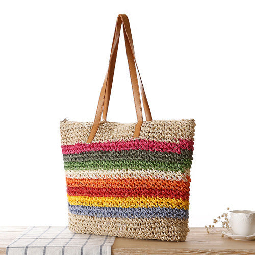 Handwoven raffia tote bag with colorful stripes LoungeYard — product view 2