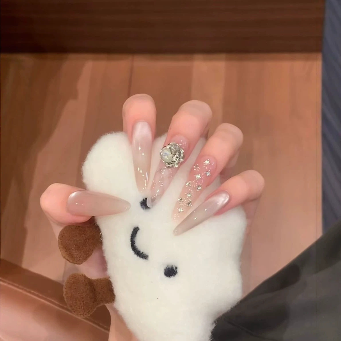 Glamorous Stiletto Nail Extensions with Glitter Accents — product view 3