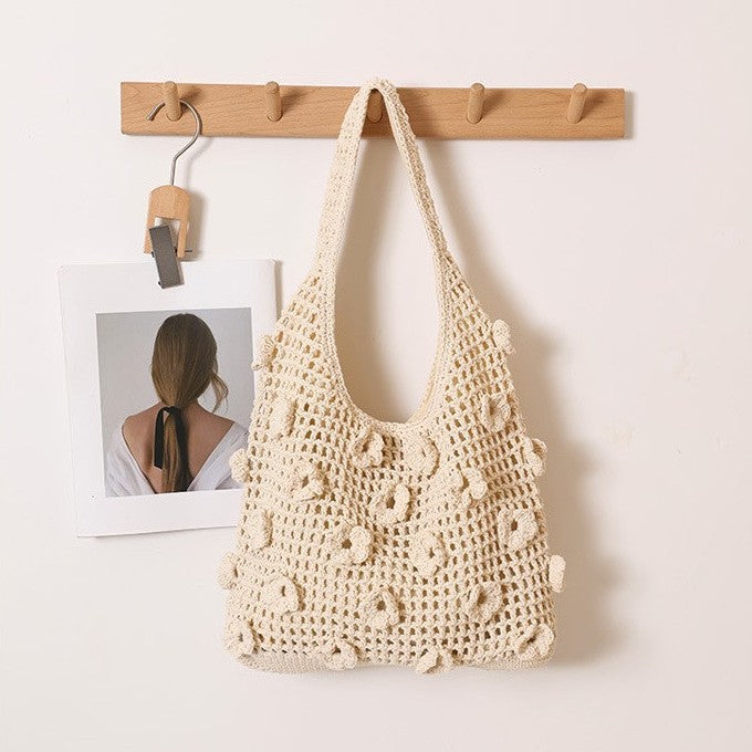 Hand-knotted shoulder bag with floral structural elements LoungeYard — product view 1