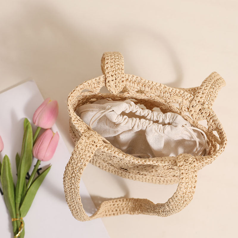 Handcrafted net straw bag with elegant straps LoungeYard — product view 3