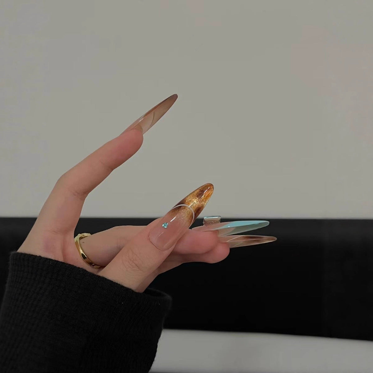 Elegant Stiletto Nail Extensions with Glitter Accents — product view 2